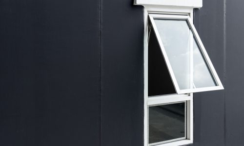 Awning Window Opening Out On Dark House